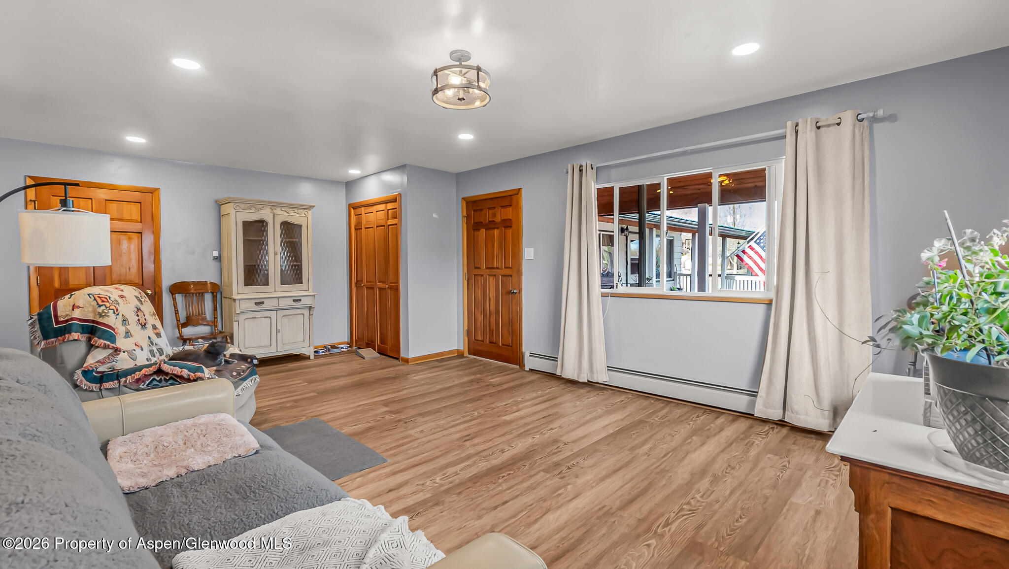 134 4th Street Meeker, CO 81641 - Photo 22 of 47 a view of a livingroom with furniture and hardwood floor