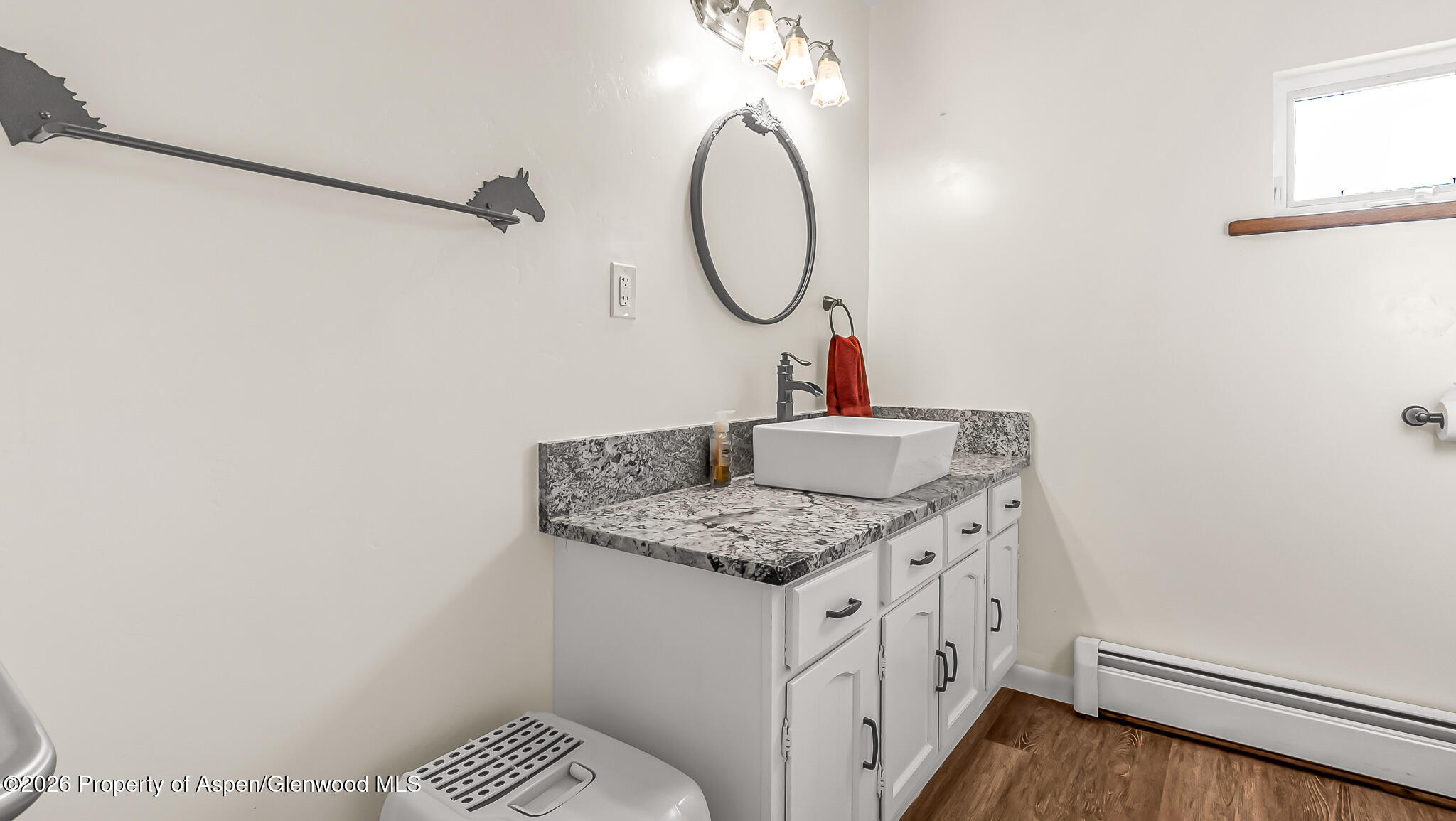 134 4th Street Meeker, CO 81641 - Photo 26 of 47 a bathroom with a sink and a mirror