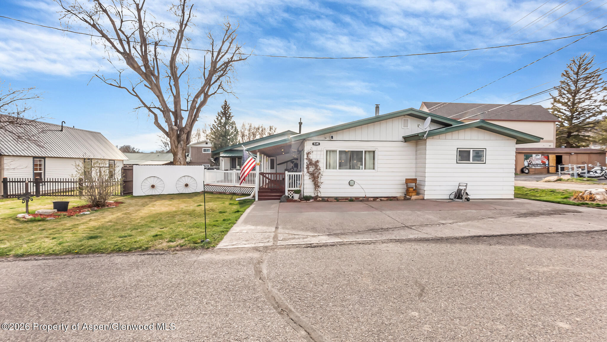 134 4th Street Meeker, CO 81641 - Photo 39 of 47 a view of a house with a yard and large tree
