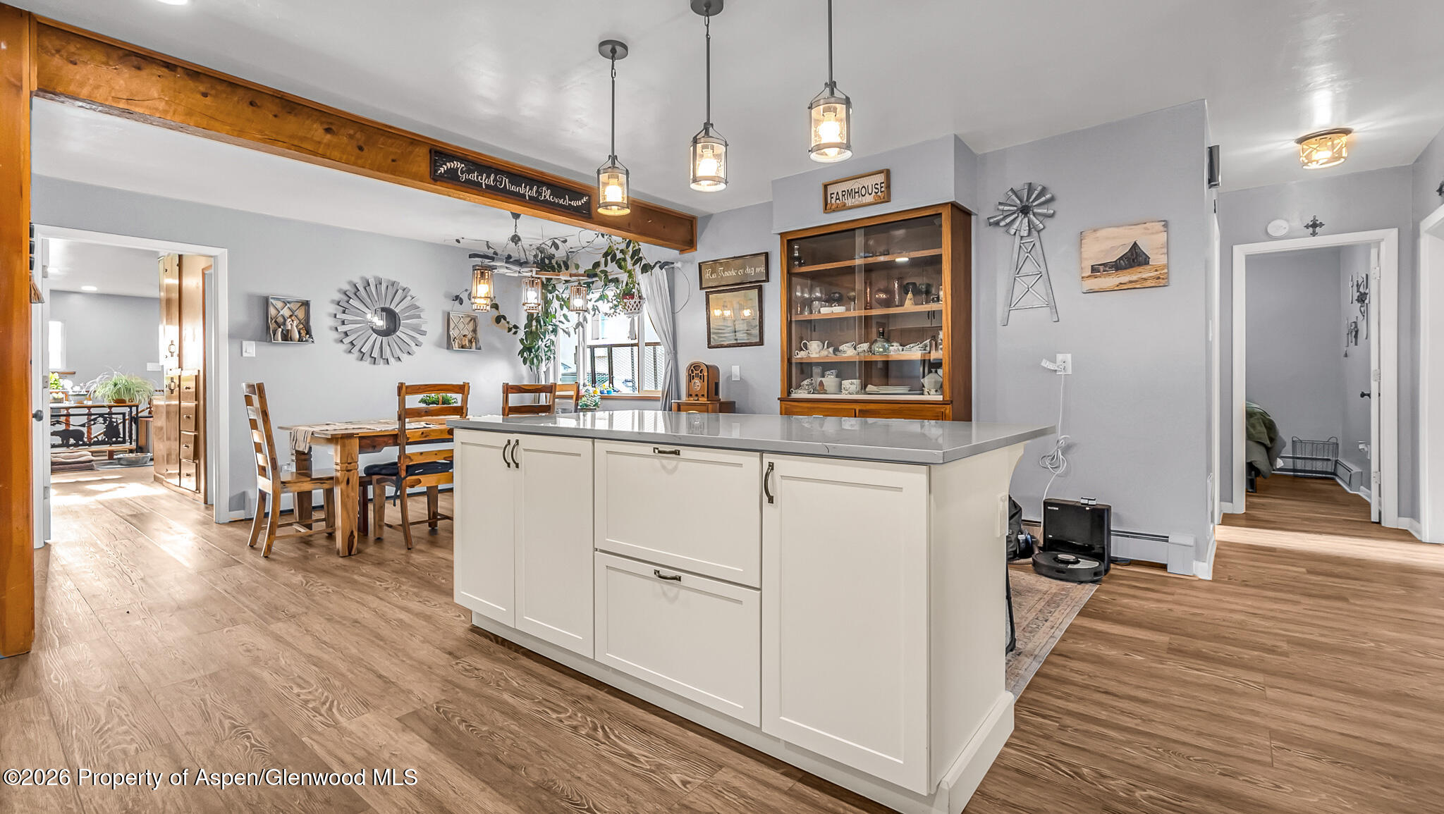 134 4th Street Meeker, CO 81641 - Photo 5 of 47 a kitchen with stainless steel appliances granite countertop a stove and refrigerator
