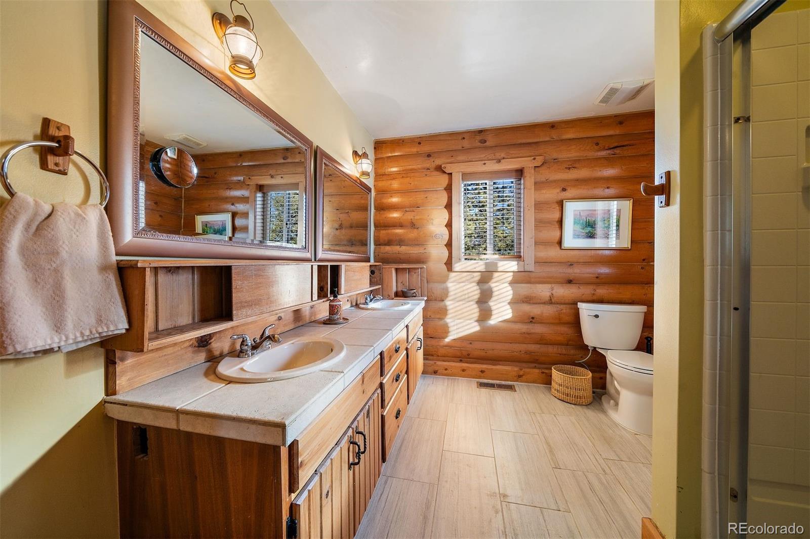 55 Rd P78 Bailey, CO 80421 - Photo 15 of 43 a living room with furniture and a fireplace
