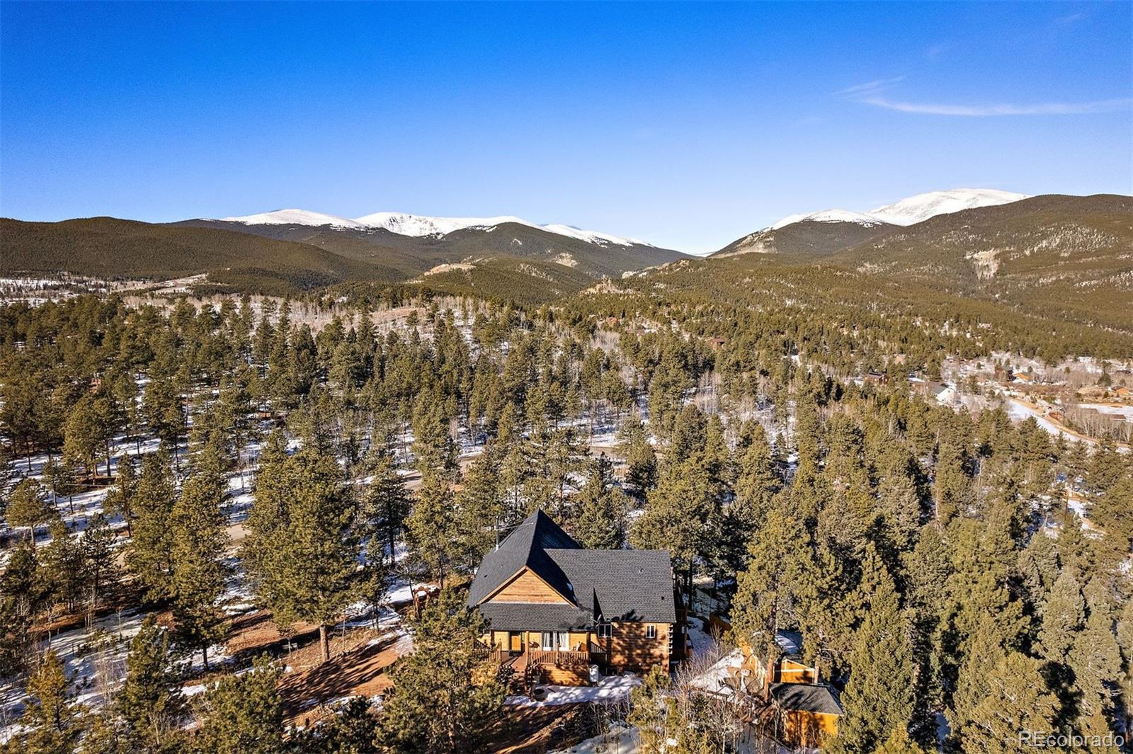 55 Rd P78 Bailey, CO 80421 - Photo 2 of 43 a view of a lush green field with mountains in the background