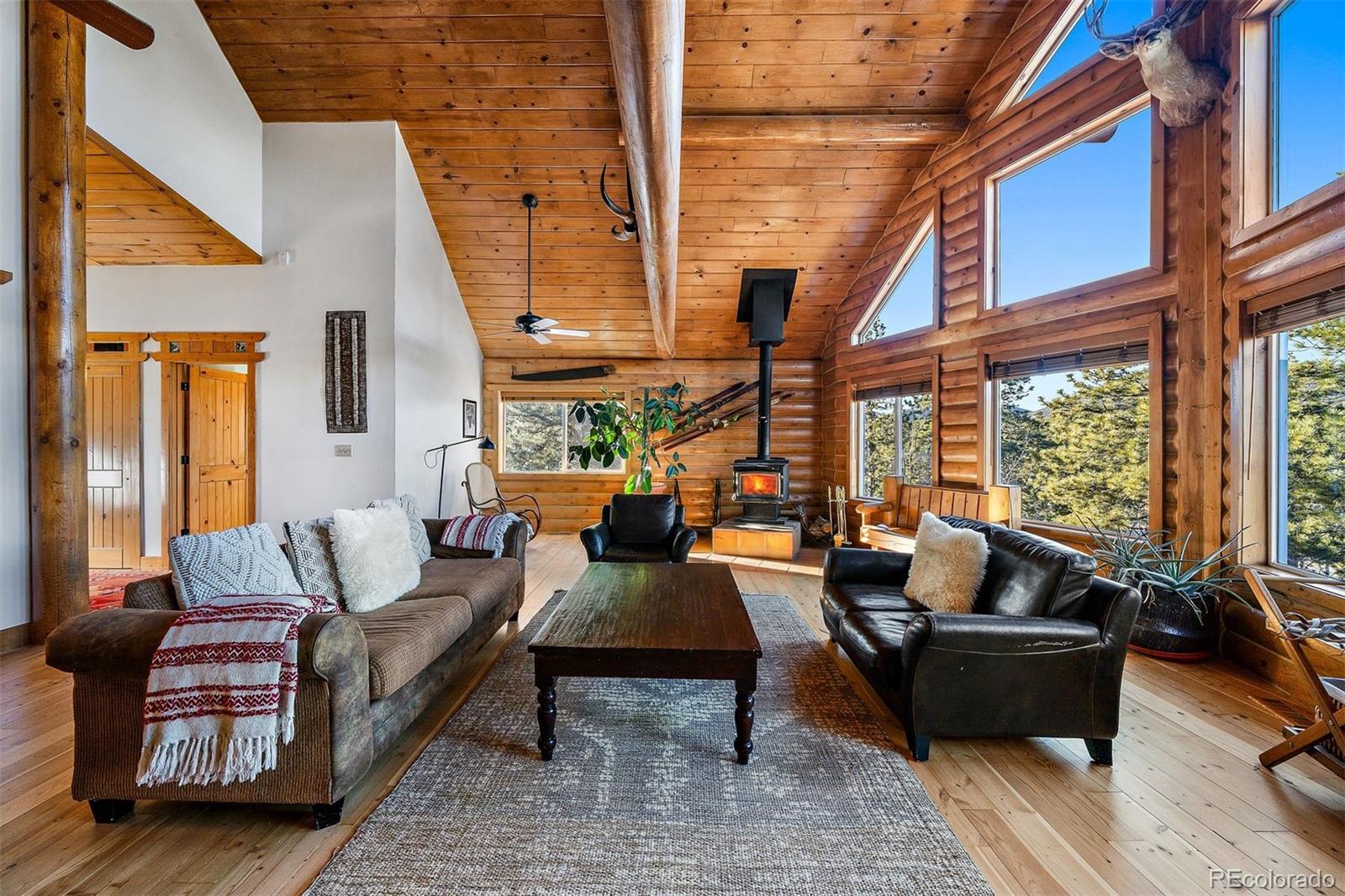 55 Rd P78 Bailey, CO 80421 - Photo 21 of 43 a living room with furniture and a large window