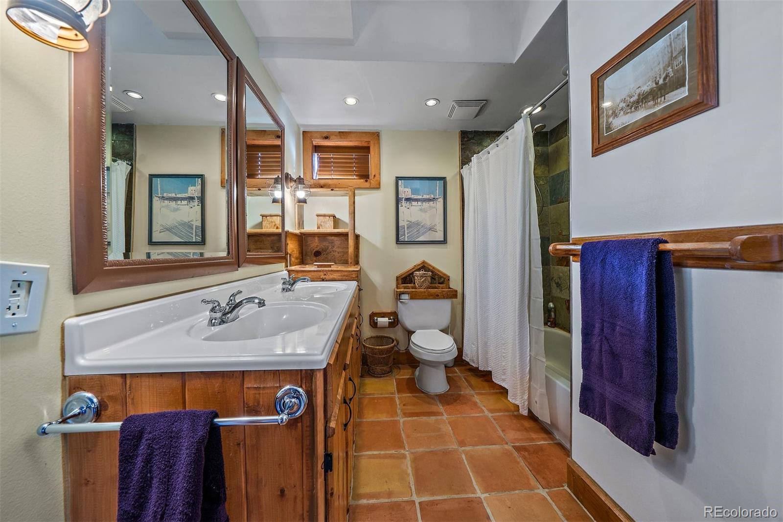 55 Rd P78 Bailey, CO 80421 - Photo 28 of 43 a bathroom with a sink and a mirror