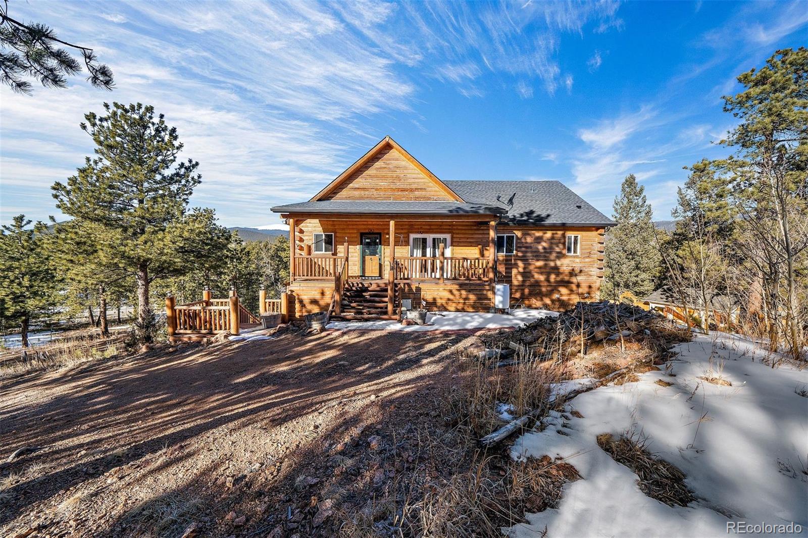 55 Rd P78 Bailey, CO 80421 - Photo 3 of 43 a view of a town with large trees and plants