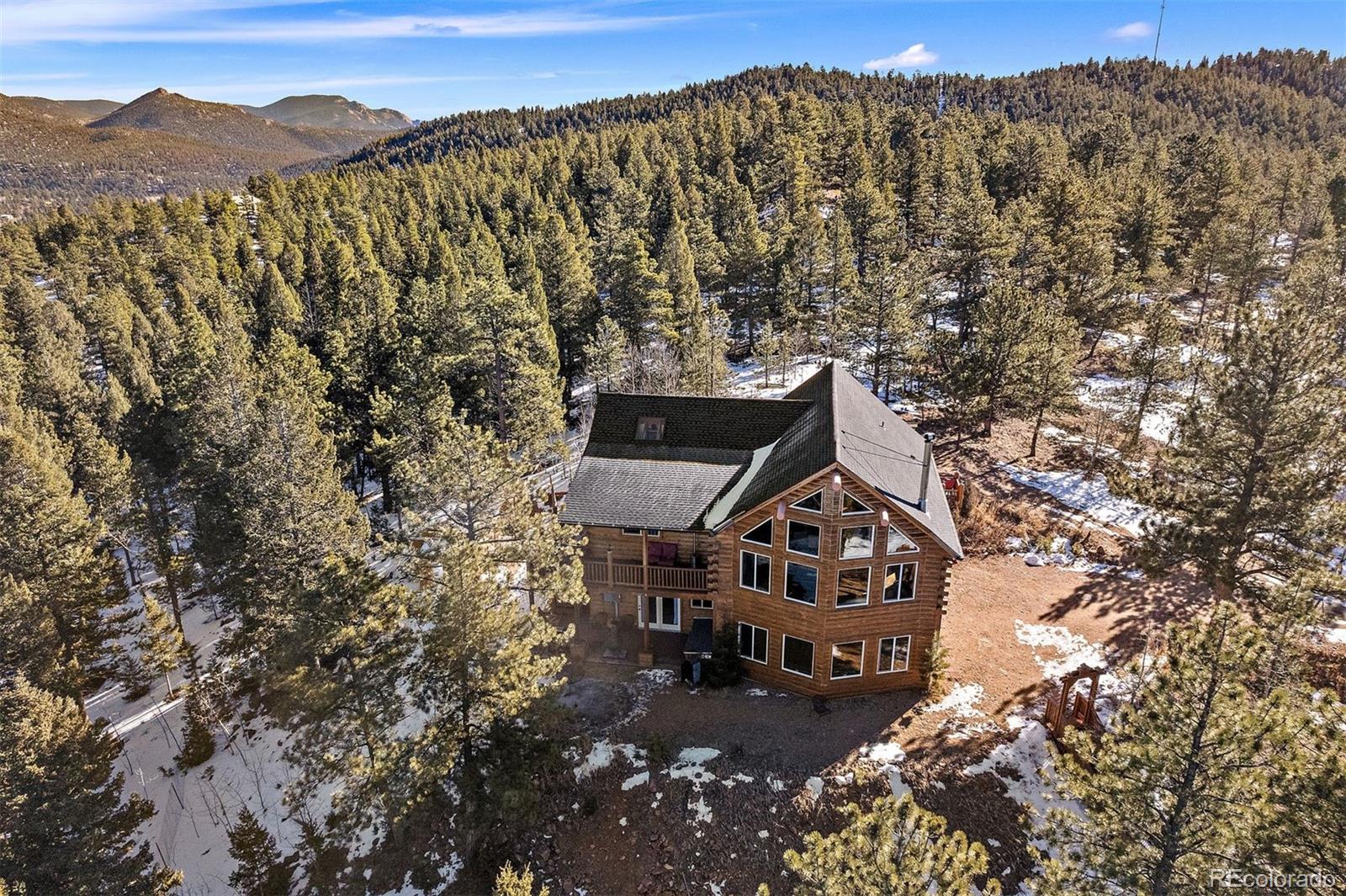 55 Rd P78 Bailey, CO 80421 - Photo 37 of 43 a view of a mountain with a trees in the background