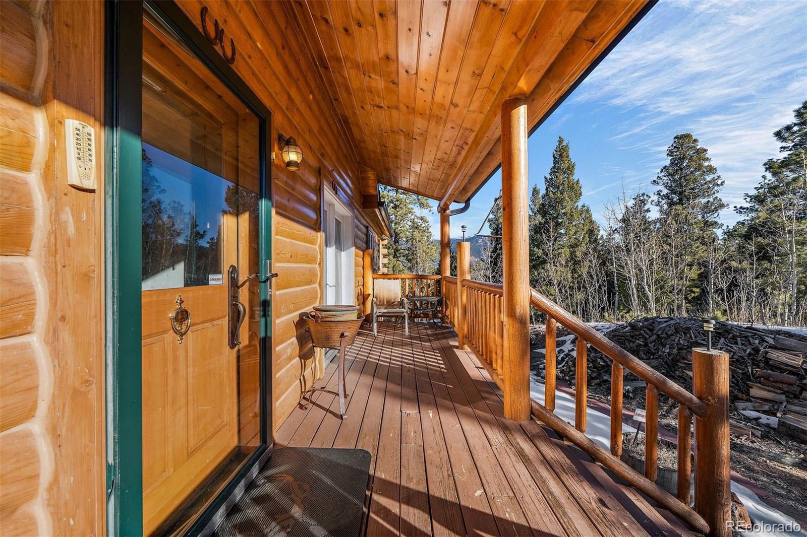 55 Rd P78 Bailey, CO 80421 - Photo 4 of 43 a view of balcony with chairs