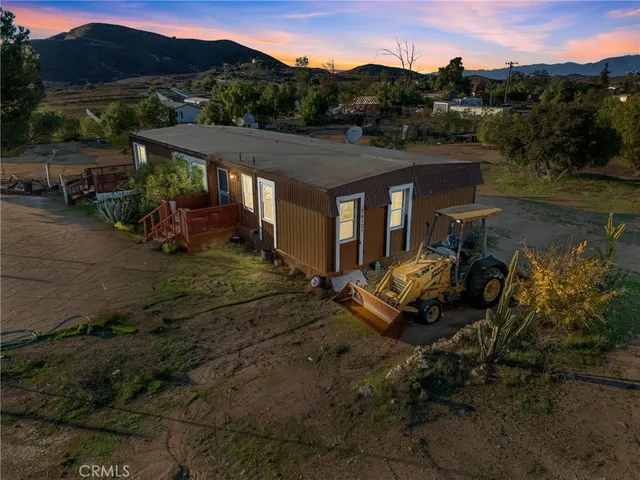 a aerial view of a house with a garden