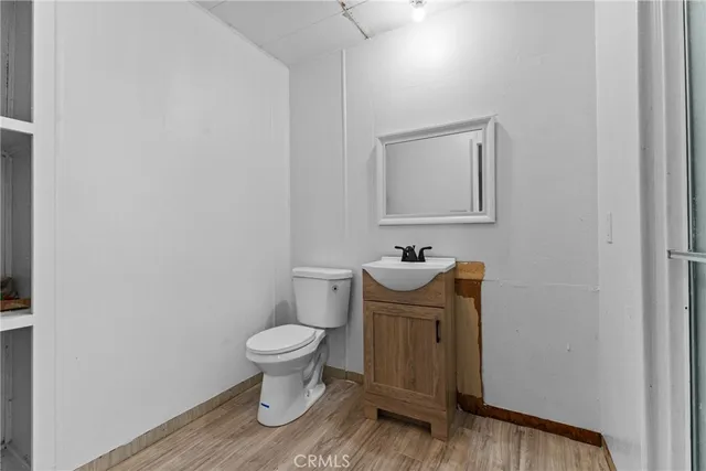 a bathroom with a toilet and a sink