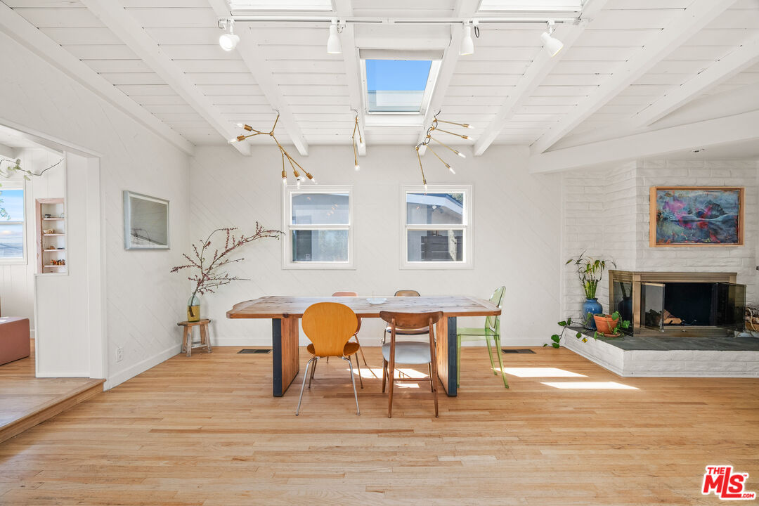 7421 Earldom Avenue Playa del Rey, CA 90293 - Photo 12 of 34 a view of a dining room with furniture and wooden floor
