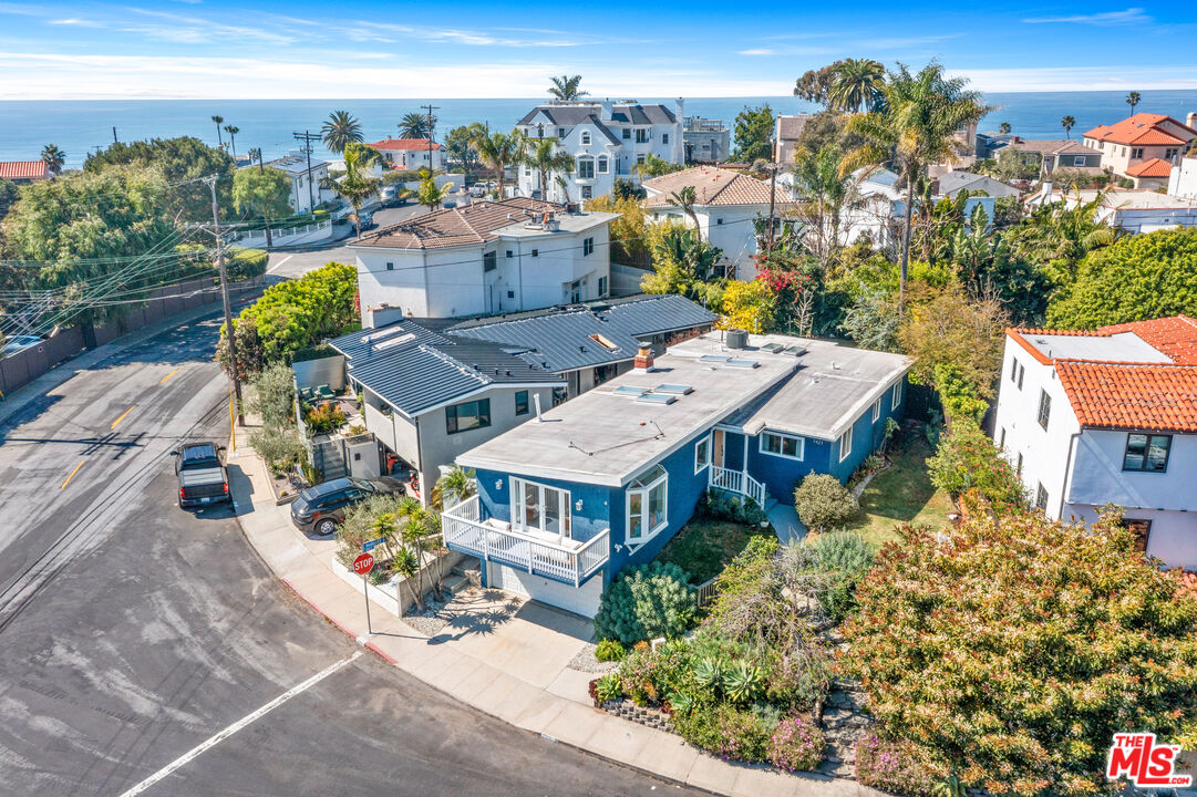 7421 Earldom Avenue Playa del Rey, CA 90293 - Photo 2 of 34 an aerial view of a house with swimming pool garden and patio