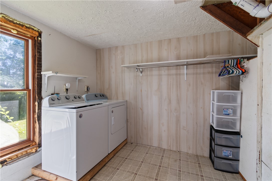 369 Bloom Road Arcadia, NY 14513 - Photo 17 of 38 The laundry room- rear of the home - there are two storage areas as well