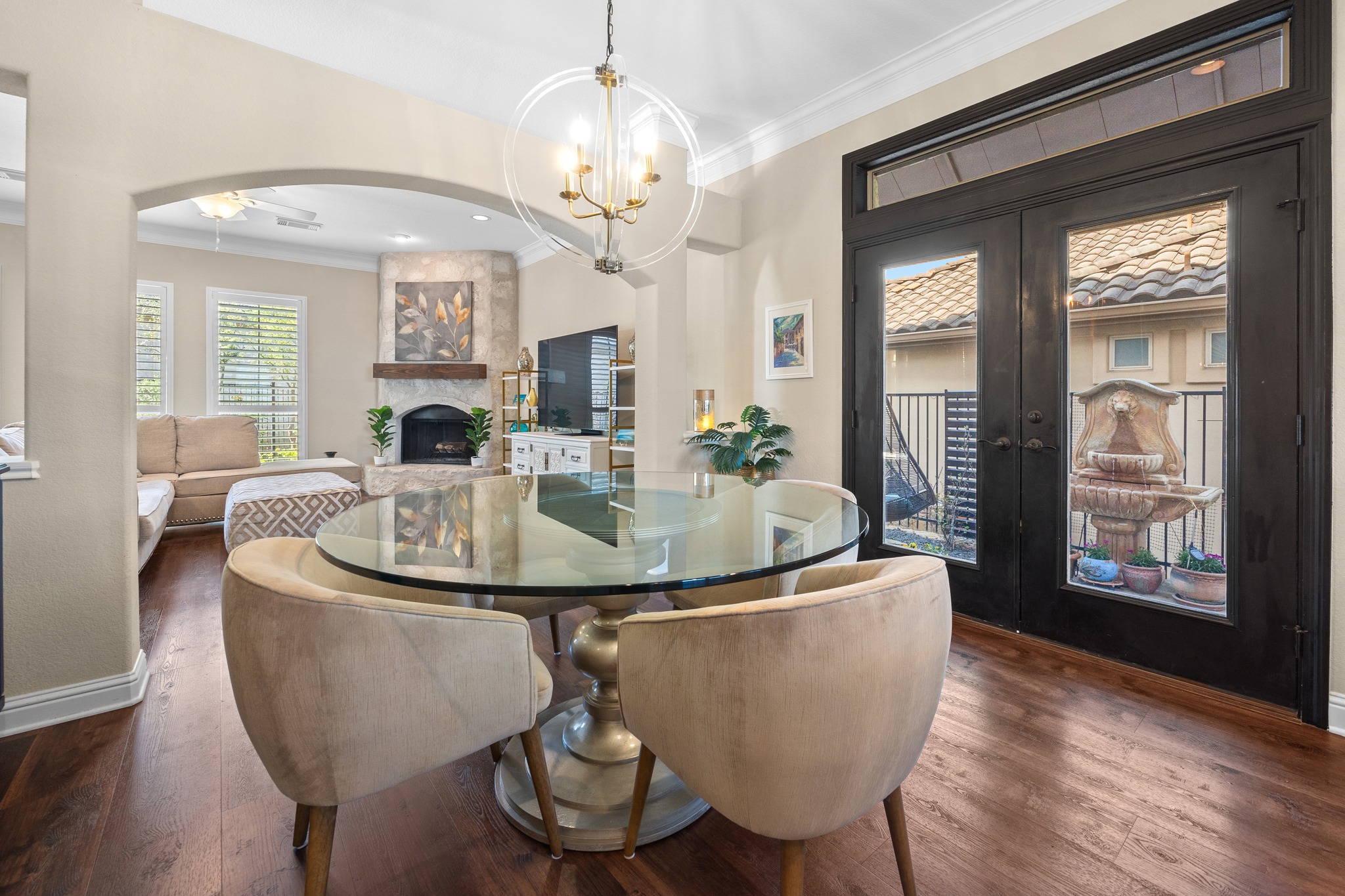 4 Hightrail Way The Hills, TX 78738 - Photo 11 of 35 a view of a dining room with furniture wooden floor and chandelier