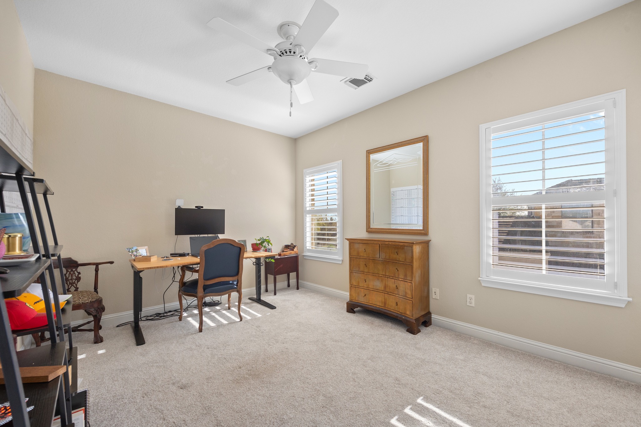 4 Hightrail Way The Hills, TX 78738 - Photo 25 of 35 a living room with furniture and a window