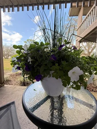 a vase of flowers sitting on a table