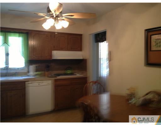 49 Meredith Road Edison, NJ 08817 - Photo 13 of 18 a kitchen with a sink cabinets and window