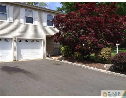 49 Meredith Road Edison, NJ 08817 - Photo 14 of 18 a house with a outdoor space