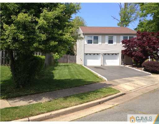49 Meredith Road Edison, NJ 08817 - Photo 17 of 18 a view of a house with a yard