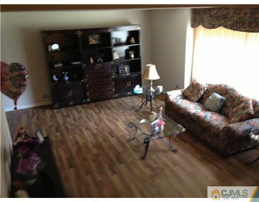 49 Meredith Road Edison, NJ 08817 - Photo 18 of 18 a living room with furniture and window