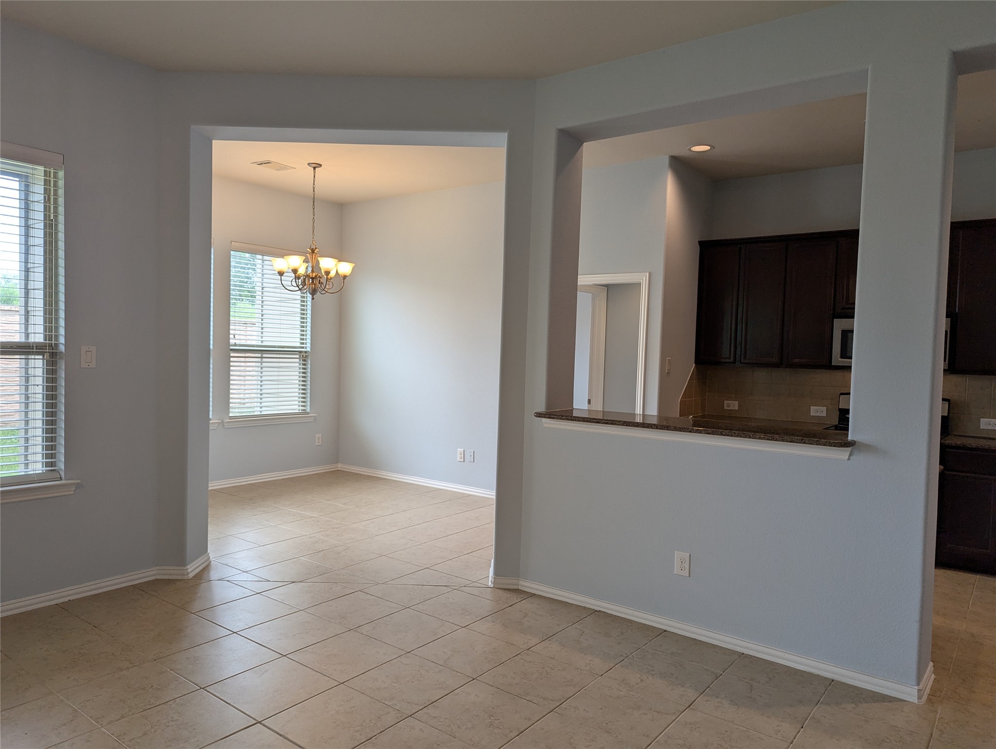 8041 Silent Deep Drive Rosenberg, TX 77469 - Photo 6 of 24 Seamless Flow from Family Room to Breakfast Nook