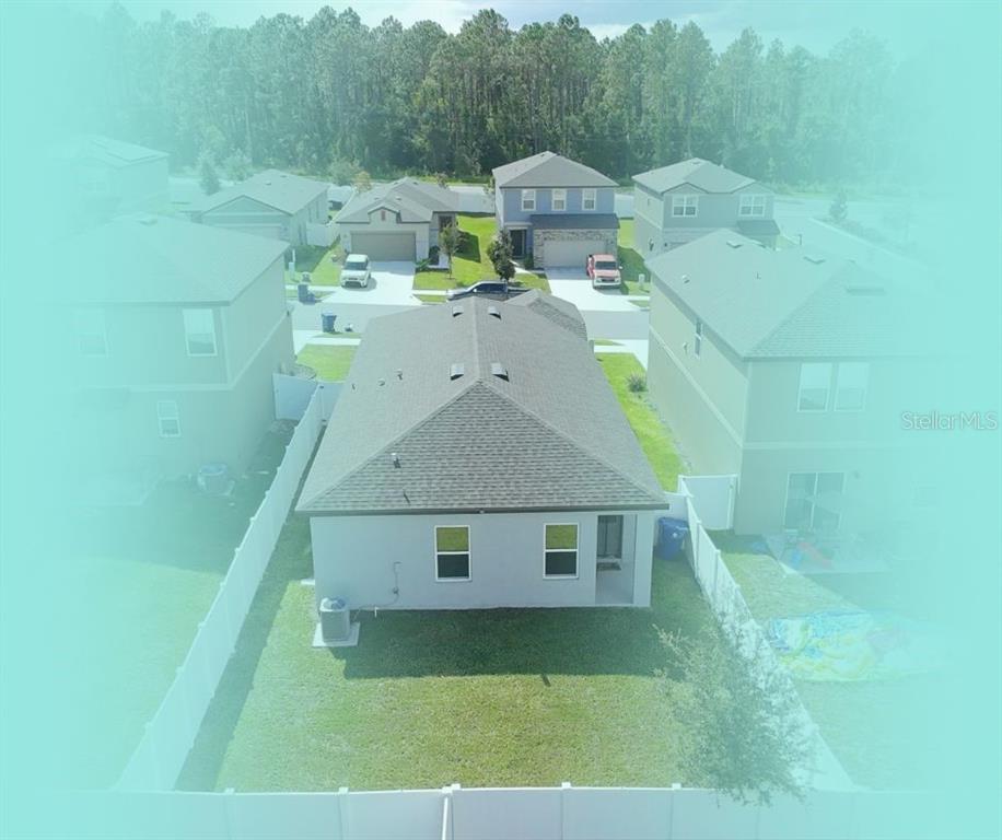 2030 Hemingway Circle Groveland, FL 34736 - Photo 18 of 21 a aerial view of a house