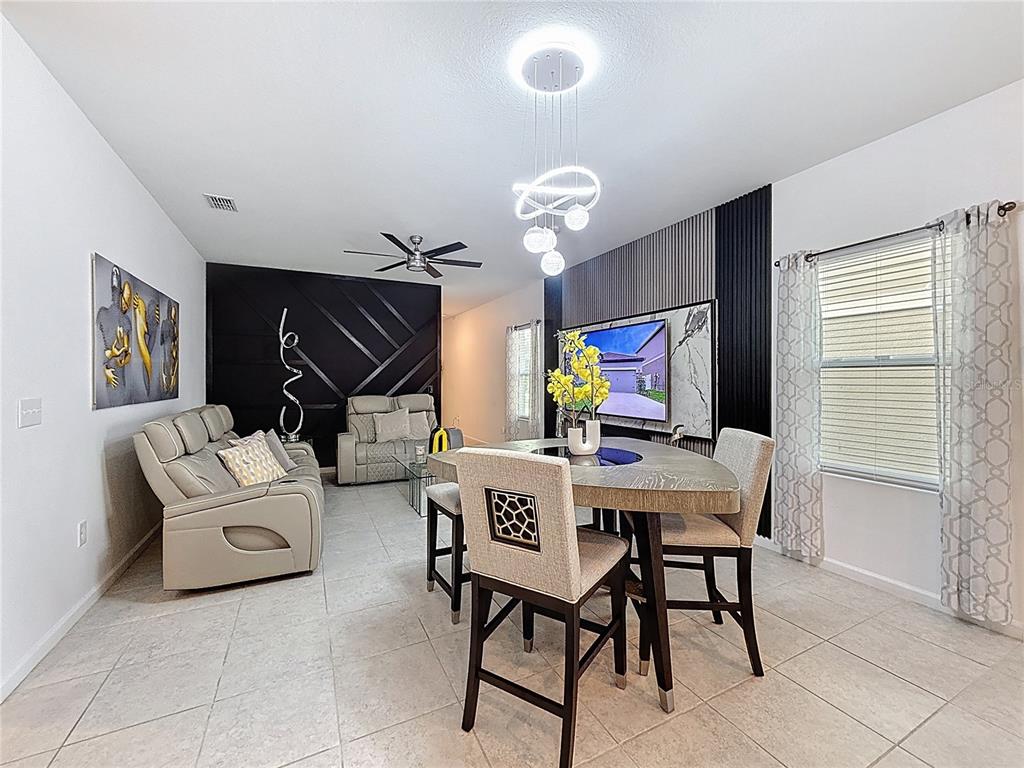 2030 Hemingway Circle Groveland, FL 34736 - Photo 5 of 21 a view of a livingroom with furniture and window