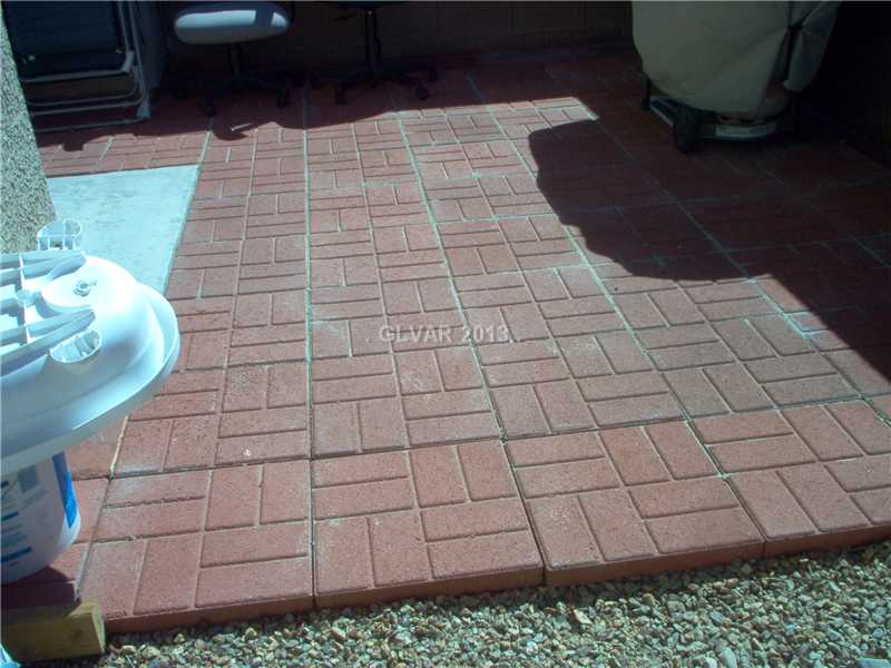 9133 Ripple Ridge Avenue, Unit 102 Las Vegas, NV 89149 - Photo 14 of 18 Patio/Deck. Pavers in court yard area