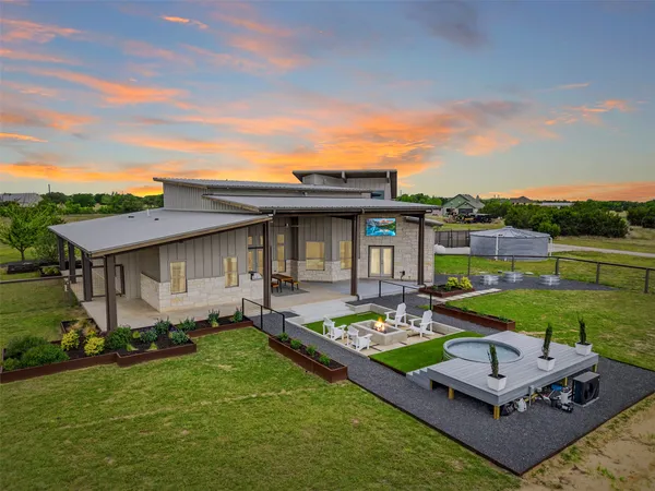 front view of a house with a big yard