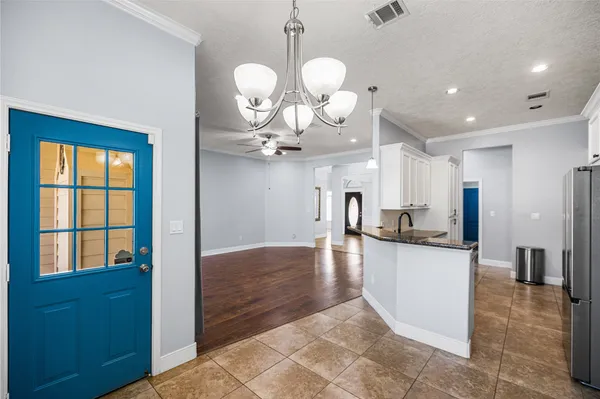 wooden floor in an empty room with a fireplace