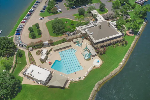 an aerial view of a house with outdoor space and street view
