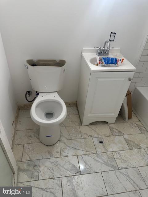 2 East 24th Street Wilmington, DE 19802 - Photo 4 of 10 a bathroom with a toilet and a sink