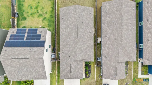 aerial view of a house with a garden