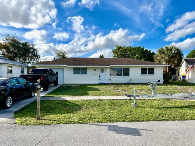 3373 Grove Road Palm Beach Gardens, FL 33410 - Photo 1 of 14 Front View
