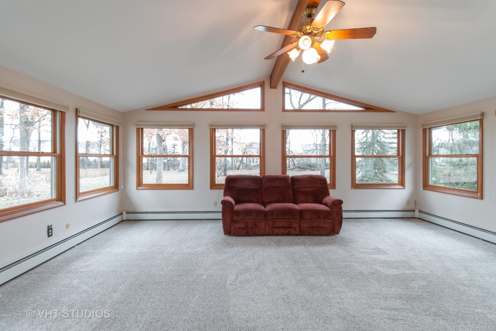 708 Hickory Road Woodstock, IL 60098 - Photo 5 of 22 a living room with furniture and a large window