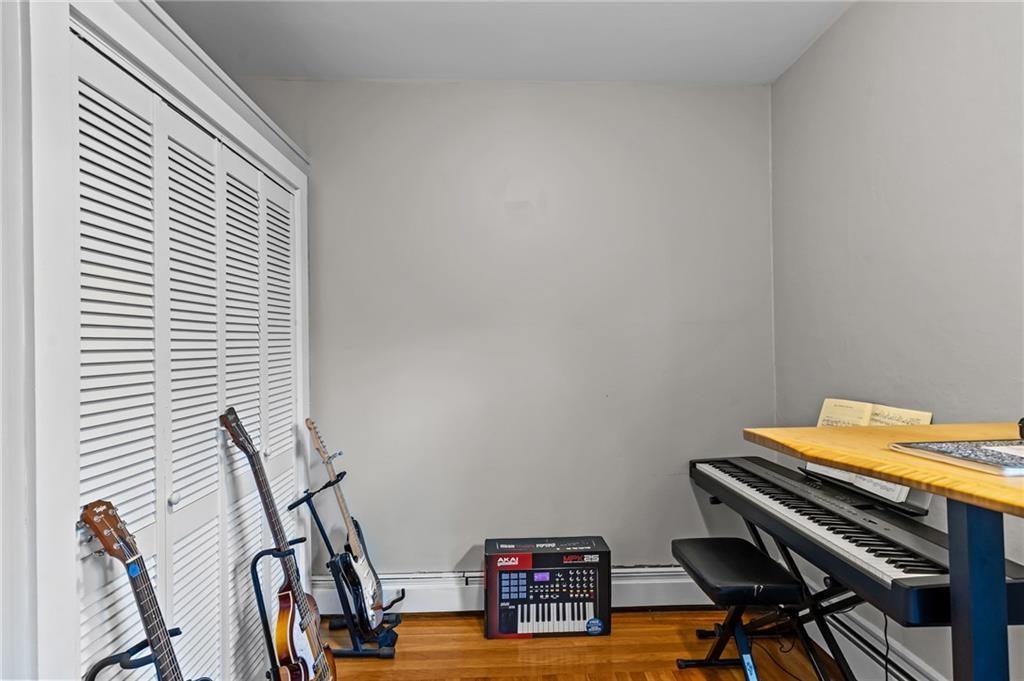 21 Federal Street Warren, RI 02885 - Photo 17 of 27 a view of a workspace with furniture and a window