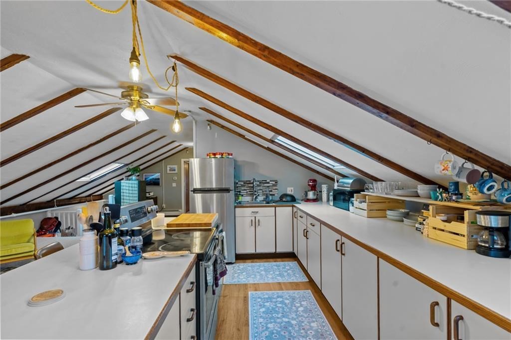 21 Federal Street Warren, RI 02885 - Photo 20 of 27 a kitchen with stainless steel appliances lots of counter top space