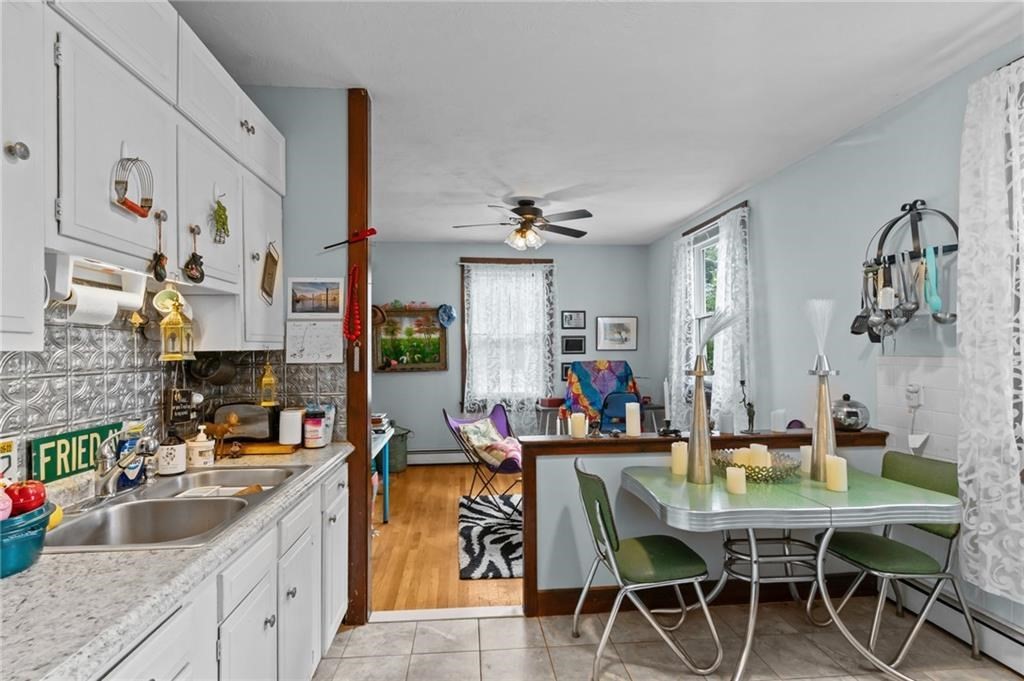 21 Federal Street Warren, RI 02885 - Photo 24 of 27 a view of a dining room with furniture and window