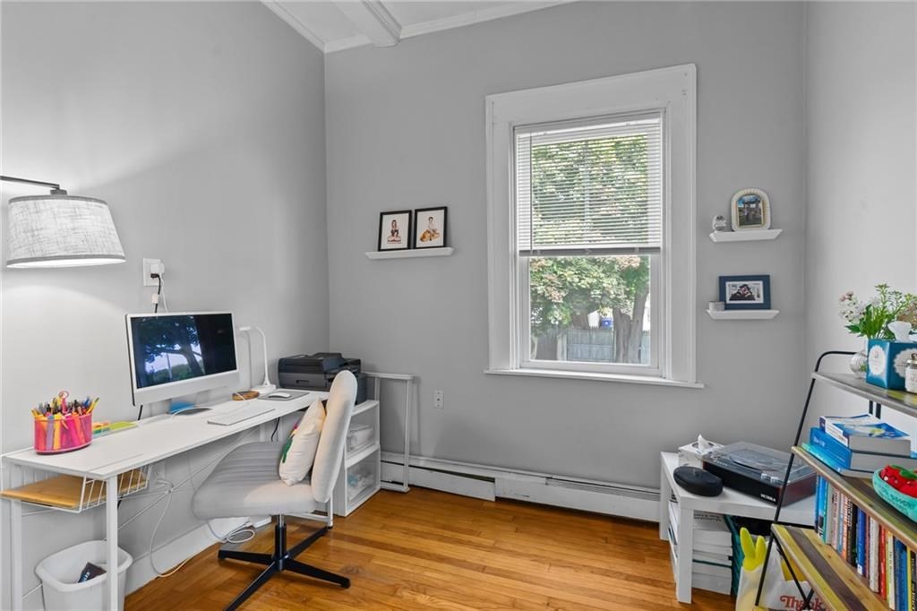 21 Federal Street Warren, RI 02885 - Photo 10 of 27 a view of a workspace with furniture and a window