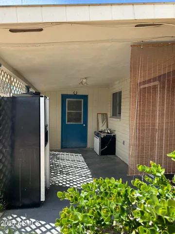 a view of a entryway door of the house and front door