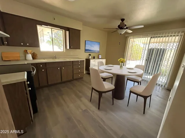 a view of a kitchen and dining room
