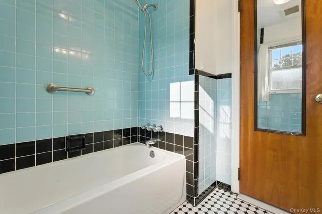 a bathroom with a bathtub