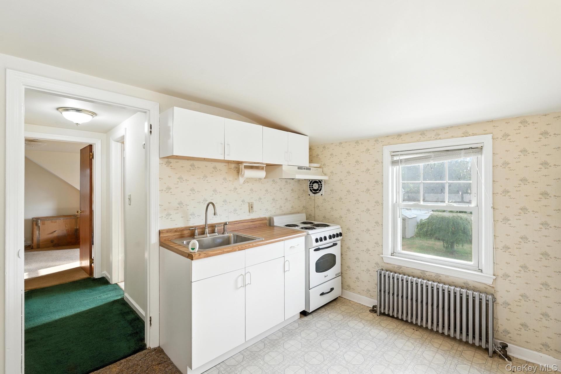 1547 Walt Whitman Road Melville, NY 11747 - Photo 14 of 25 a utility room with dryer and washer