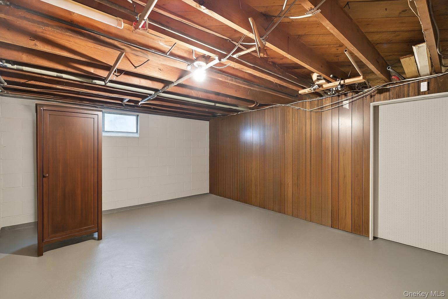 1547 Walt Whitman Road Melville, NY 11747 - Photo 18 of 25 a view of an empty room