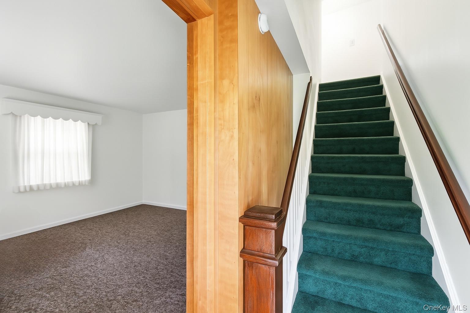 1547 Walt Whitman Road Melville, NY 11747 - Photo 6 of 25 a view of entryway and hall with wooden floor
