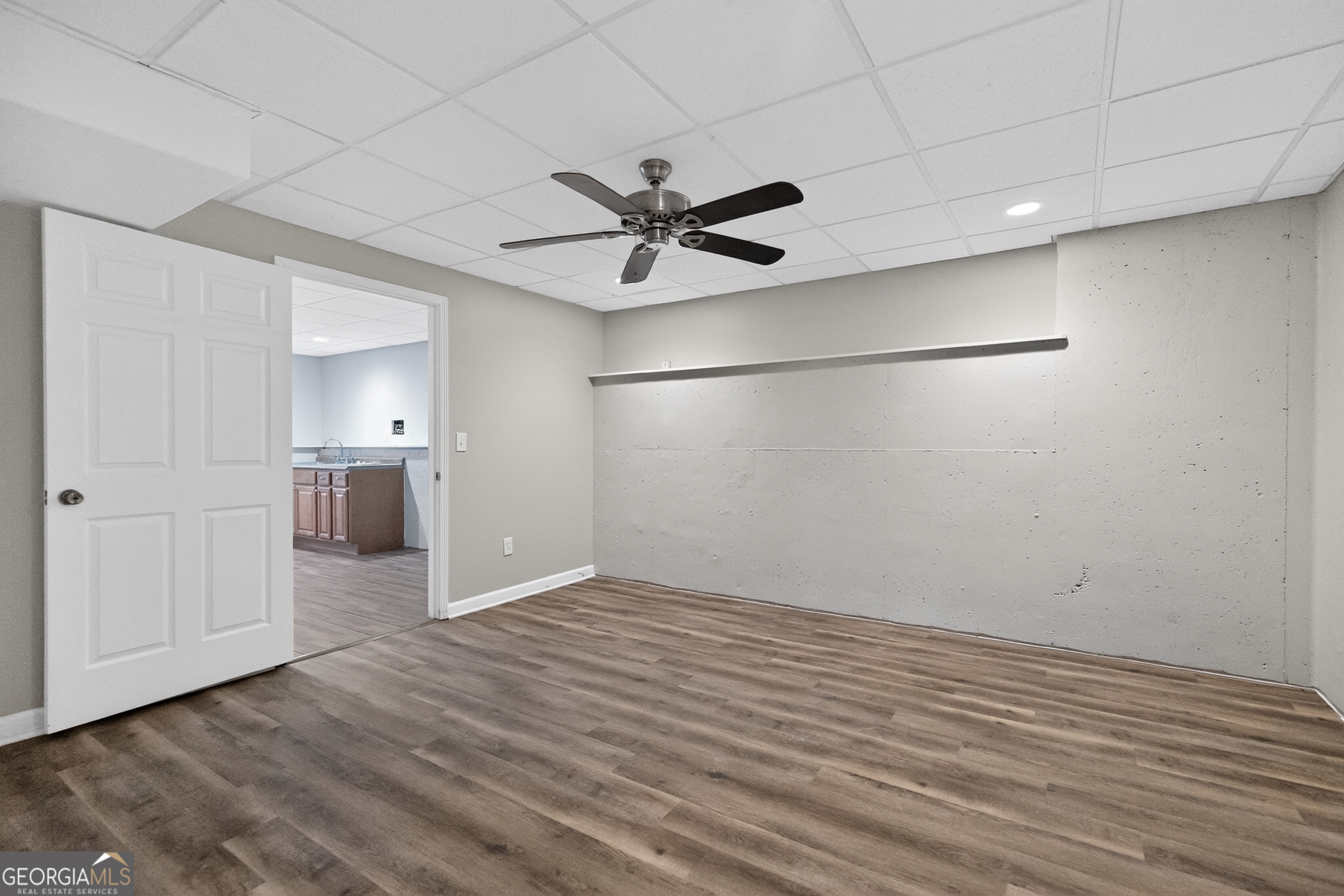 178 Rachel Boulevard Temple, GA 30179 - Photo 16 of 30 wooden floor in an empty room with a window