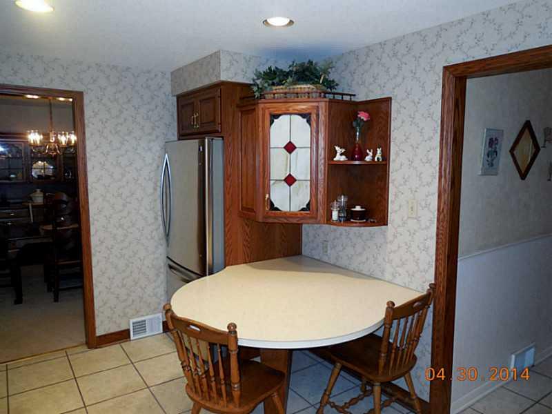 257 Lytton Road Coraopolis, PA 15108 - Photo 5 of 25 Kitchen. The built in table with shelving above allows you to grab a quick bite to eat or use it as a prep station for creating meals!
