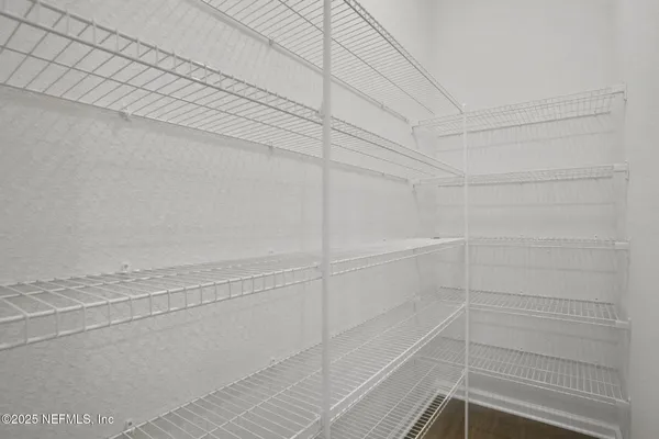 a kitchen with a sink and stove top oven