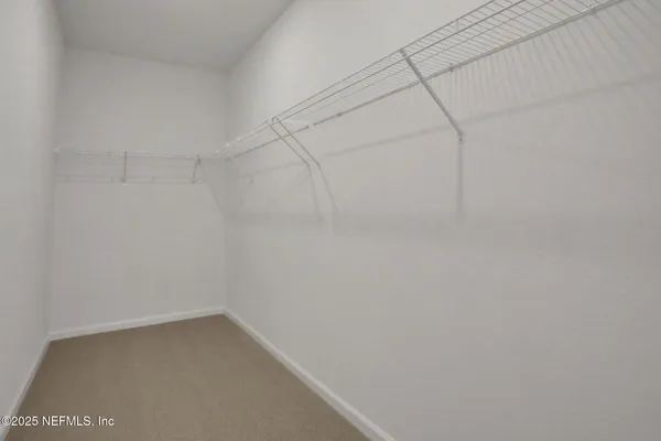 a view of swimming pool with outdoor seating