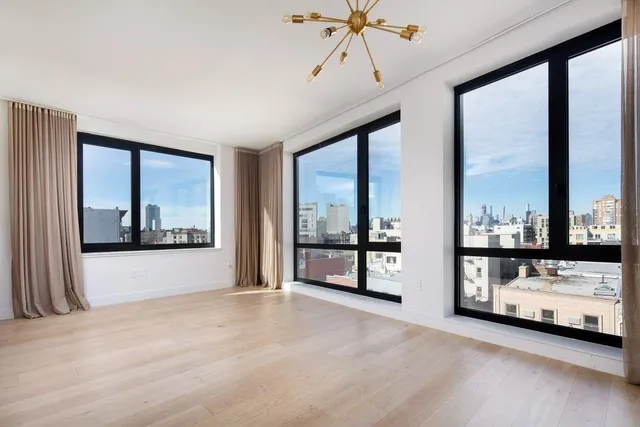 a bathroom with a shower a toilet and sink