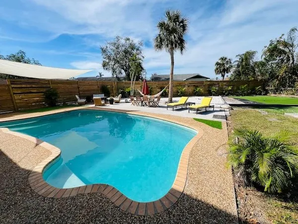 a view of a house with a swimming pool